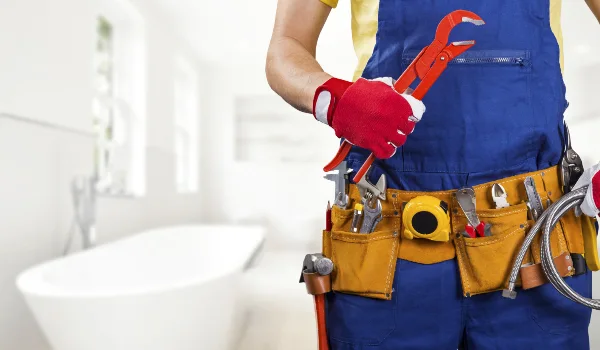 the torso of a plumbing technician showing a tool belt in Cedar Park, TX - Residential Plumbing Services the torso of a plumbing technician showing a tool belt in Cedar Park, TX - Residential Plumbing Services